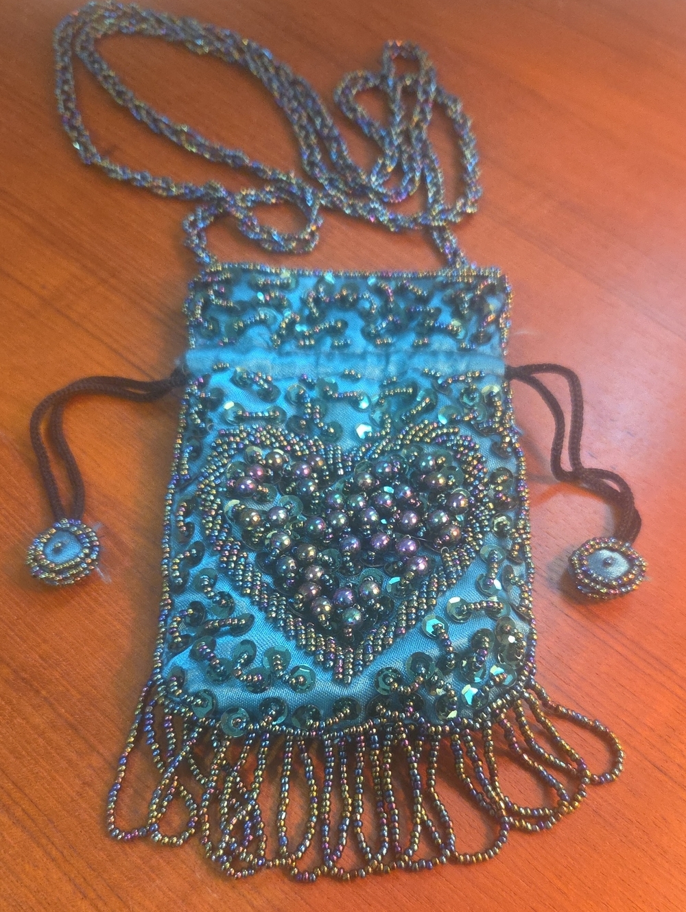 Beaded Teal Drawstring Crossbody Bag with Heart Motif